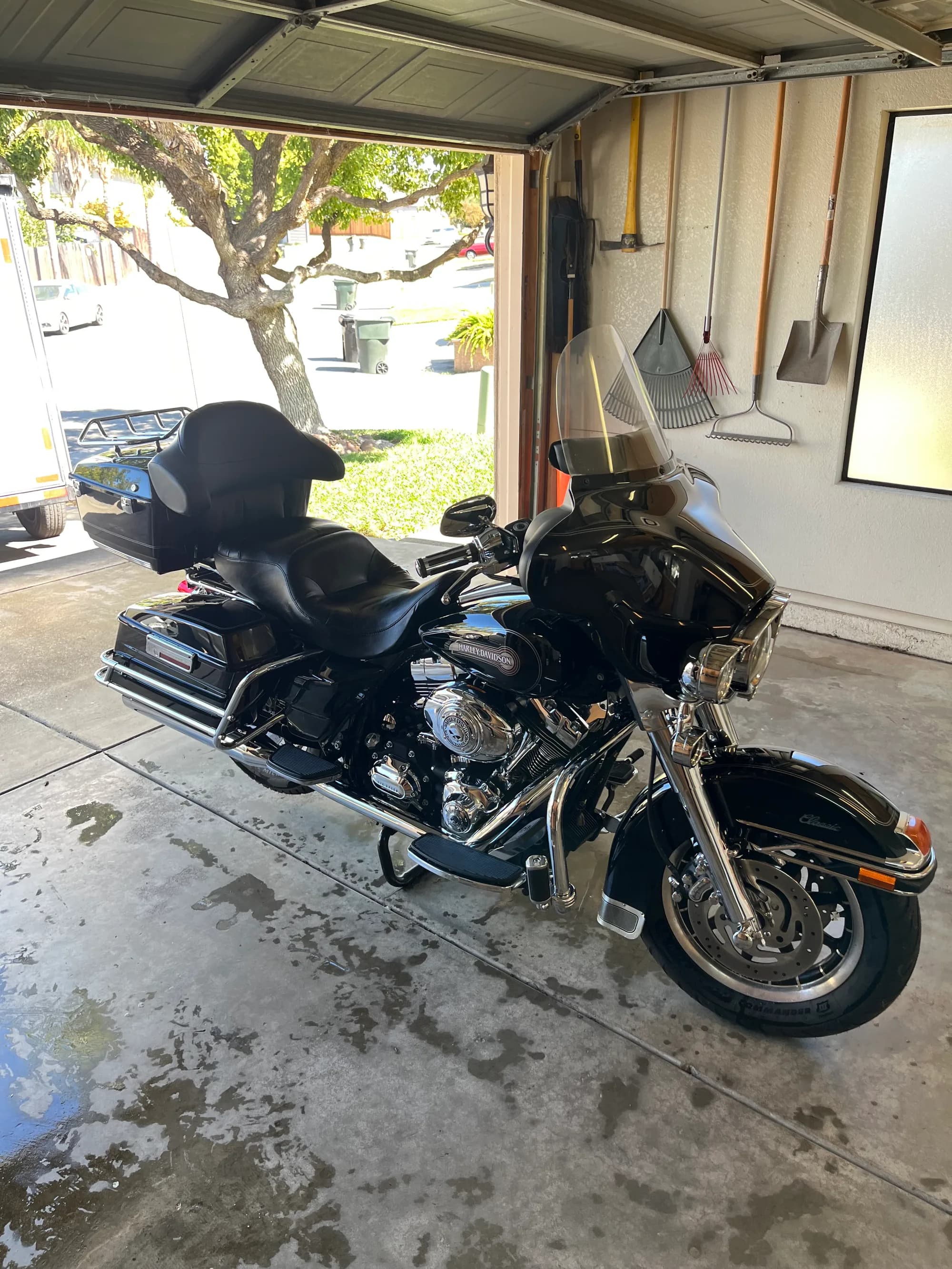 Black Harley-Davidson touring motorcycle after a Cali Performance Detailing session