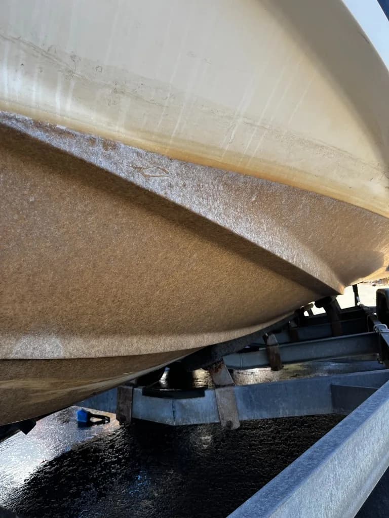 Oxidized Seaswirl hull underside as received, before correction