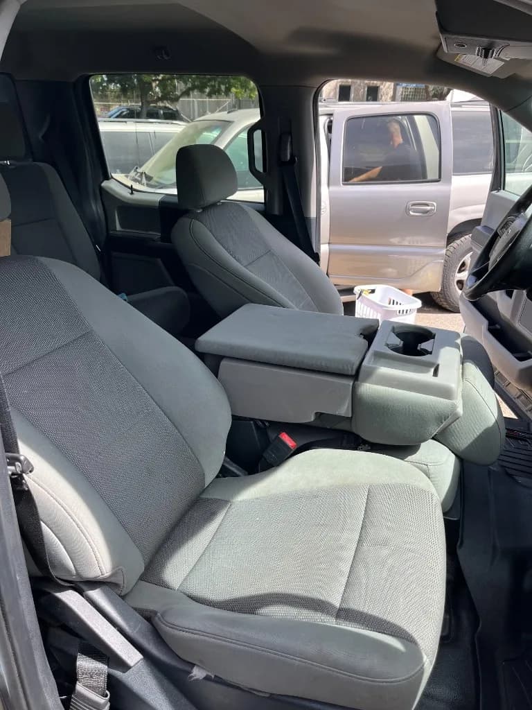 Crew-cab work truck front cabin after an interior detail